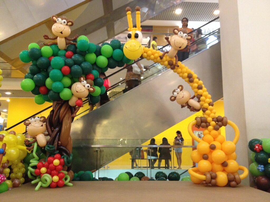 Giraffe and Monkey Balloon Arch by Lily Tan