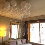 helium balloons on ceiling