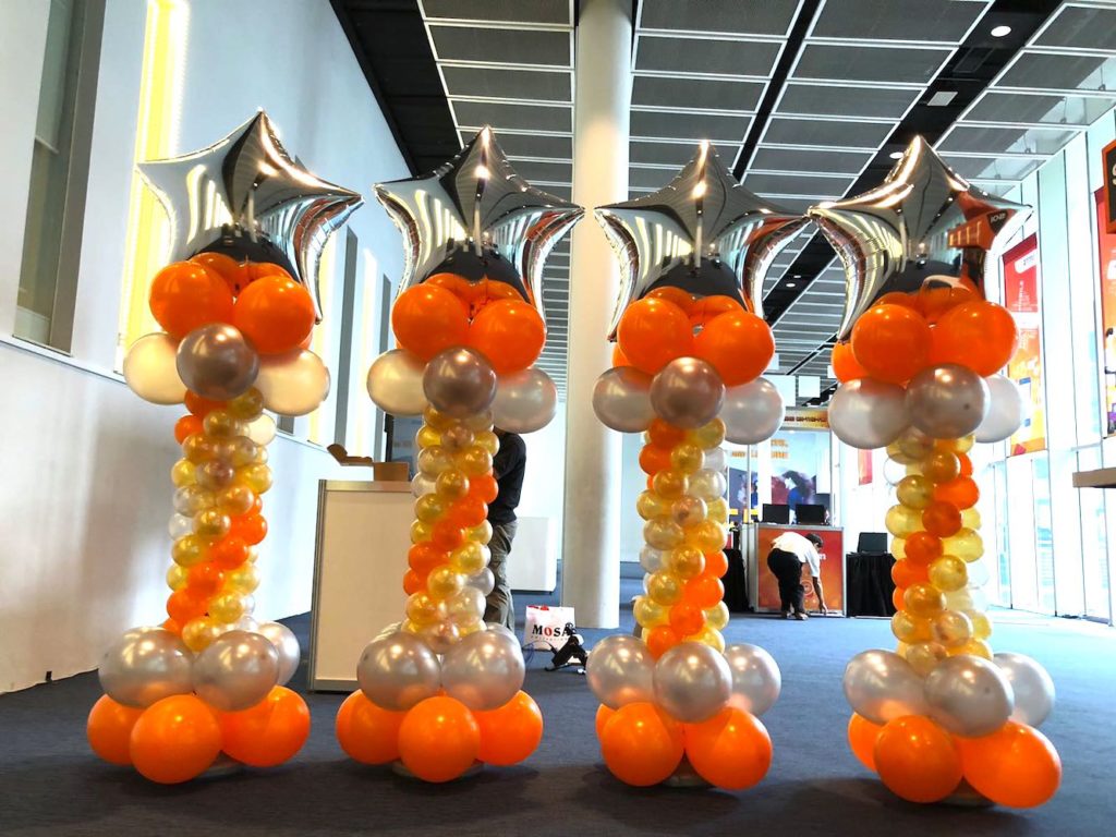 Silver and Orange Balloon Star Columns