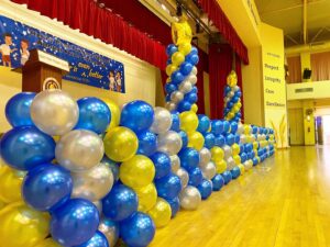 Blue white and yellow balloon decoration for stage