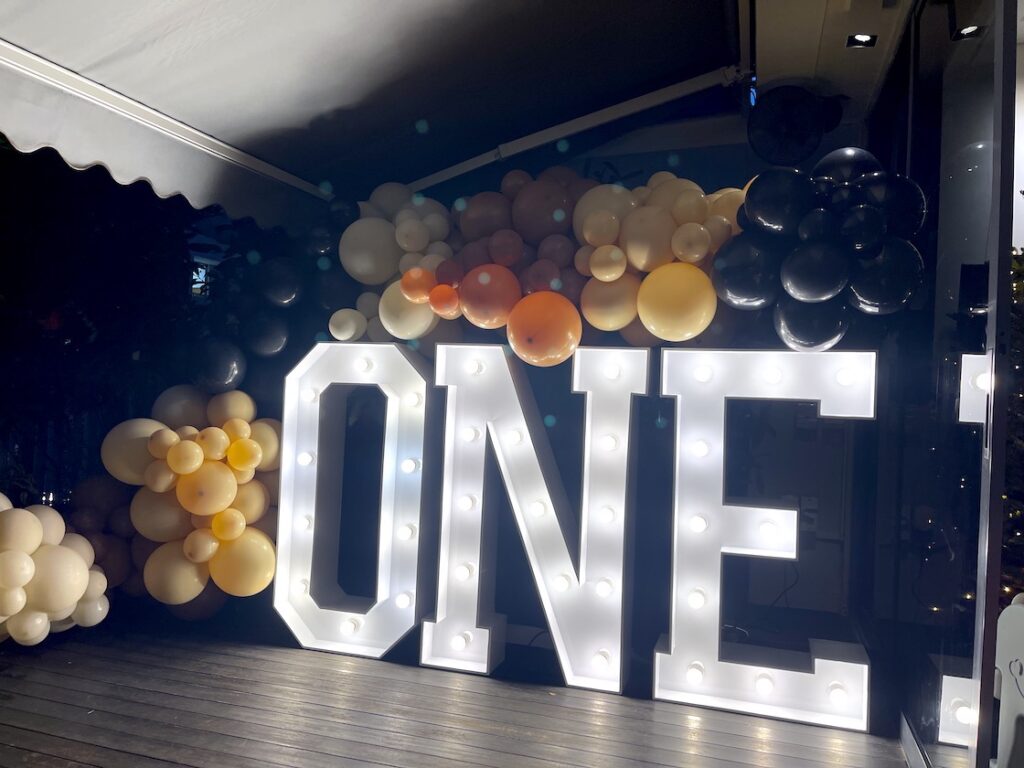 Classy Organic Balloon Garland with Lighted Letter Displays