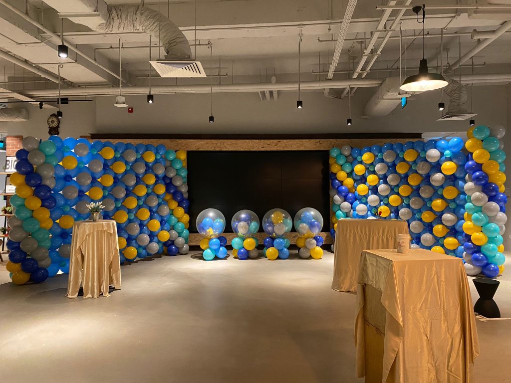 Balloon wall backdrop with exploding balloons