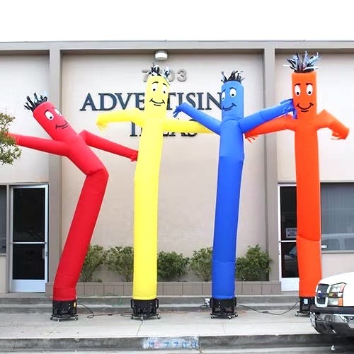 Colourful inflatable air dancers rental Singapore – red, yellow, blue and orange tube men at outdoor event